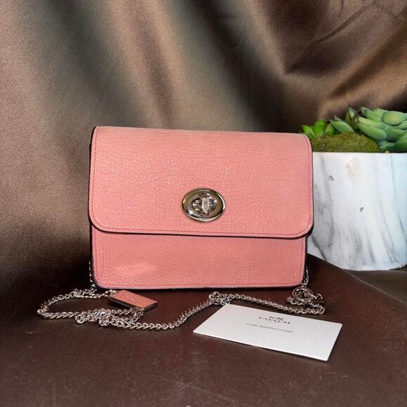 Coach Handbags - Coach pink leather crossbody bag excellent condition
